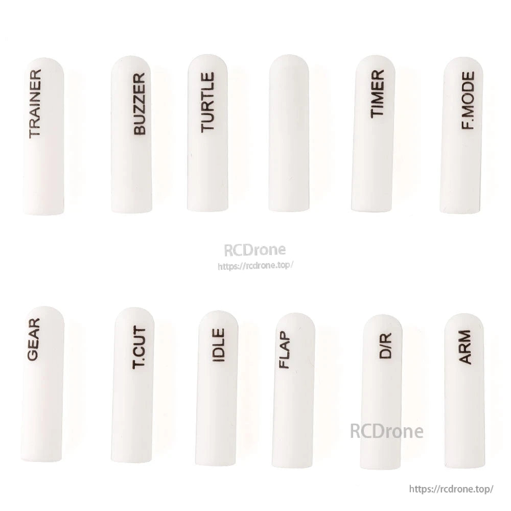 White long silicone switch covers with dark printed labels, 12-piece labeled set