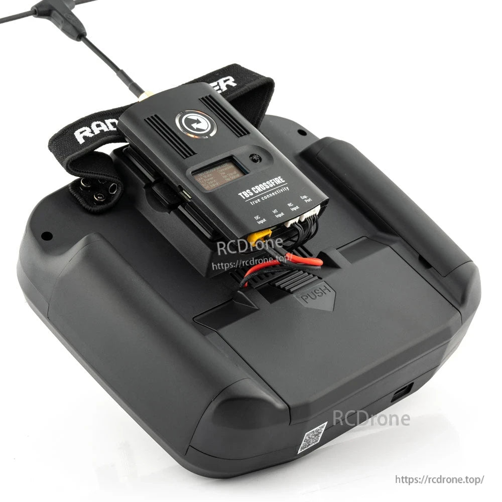 RadioMaster transmitter rear view with battery compartment open, showing installed battery and wiring
