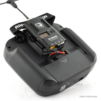 RadioMaster transmitter rear view with battery compartment open, showing installed battery and wiring