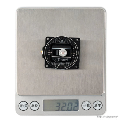 Single gimbal on digital scale showing weight reading 32.02 g