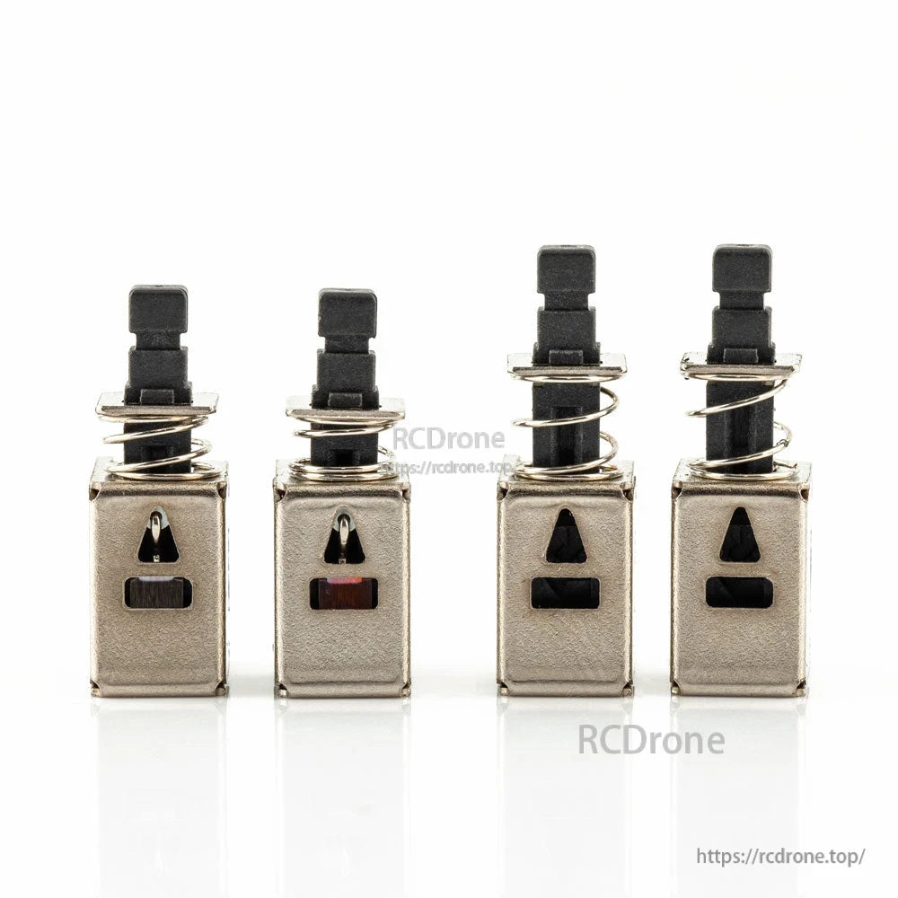 RadioMaster Boxer Switch set front view, four replacement switches with spring collars and black actuator tops