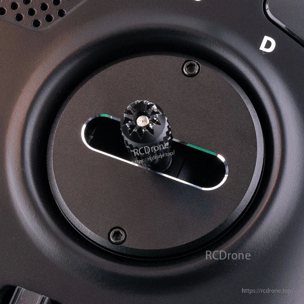 CNC axis lock plate installed on RadioMaster gimbal with horizontal slot and stick knob close-up