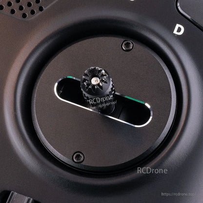 CNC axis lock plate installed on RadioMaster gimbal with horizontal slot and stick knob close-up