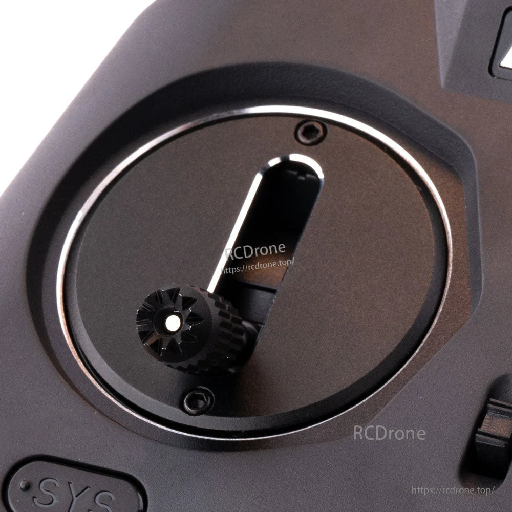 Stick shift gate plate on radio gimbal with vertical slot and thumb knob, angled close-up