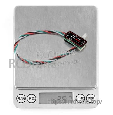 ERS-BA01 barometer sensor placed on a digital scale for weight reference