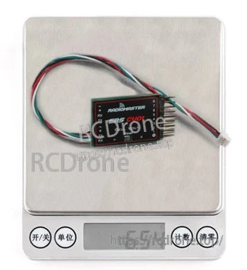 ERS-CV01 sensor placed on a digital scale indicating approximate 6.5 g weight with cable attached