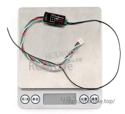 ERS-RB01 RPM-BLDC sensor on a scale showing 4.8 g weight with attached cable and connector