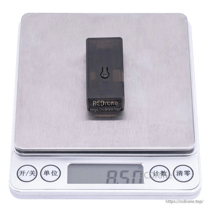 RadioMaster flasher module on digital scale showing 8.50 g weight reading