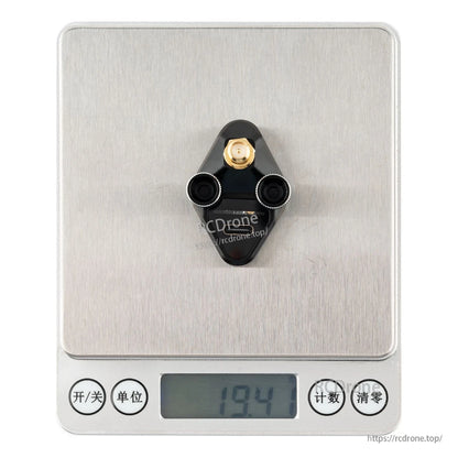 GR-01 receiver on digital scale showing 19.4 g weight
