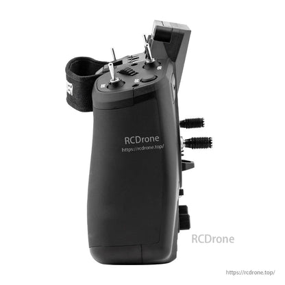 GX12 transmitter left side profile showing side grips, top switches, and attached neck strap