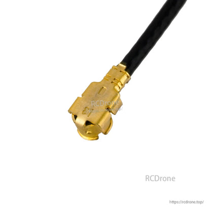IPEX1 connector close-up on antenna lead, angled side view of gold plug housing