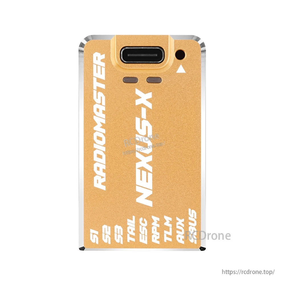 NEXUS-X flight controller top view in gold finish with USB-C connector opening