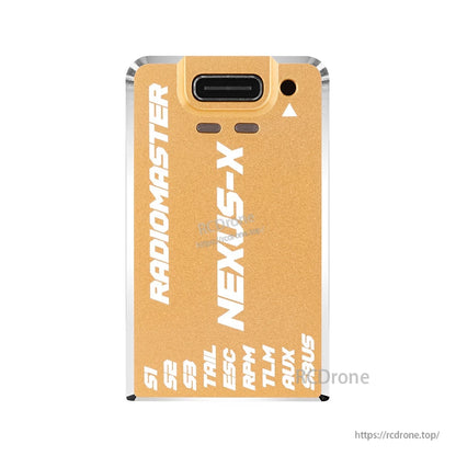 NEXUS-X flight controller top view in gold finish with USB-C connector opening