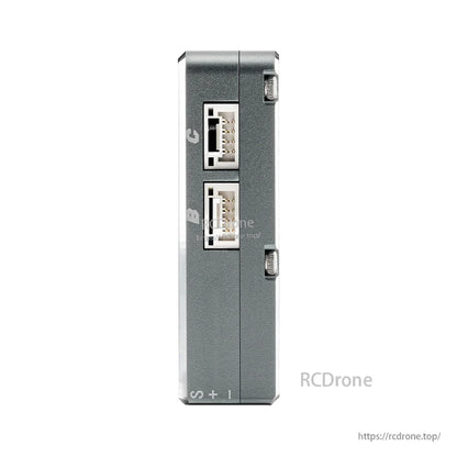 NEXUS-X side view with two stacked white connector sockets and S/+ marking at base