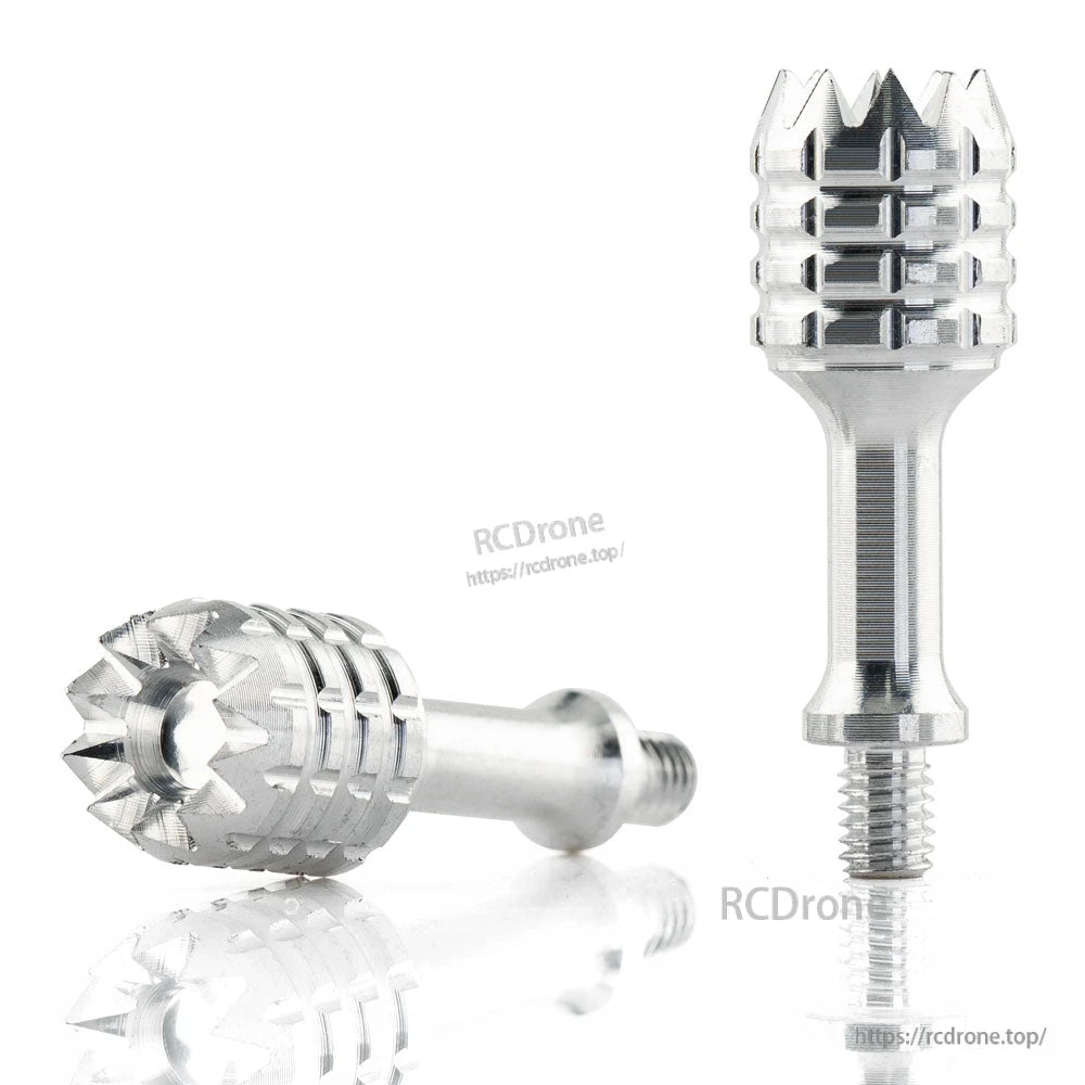Two metal gimbal sticks on white surface, one upright and one lying down to show grip pattern
