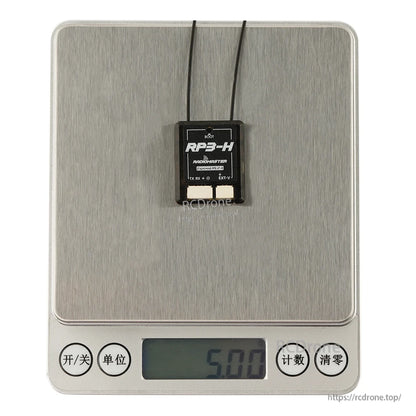 RP3-H receiver on digital scale display reading 5.00, showing compact size