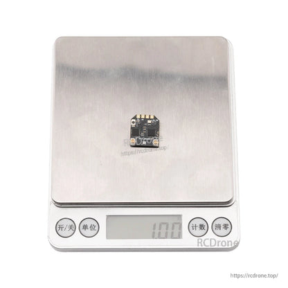 Receiver shown on digital scale displaying 1.00 g weight