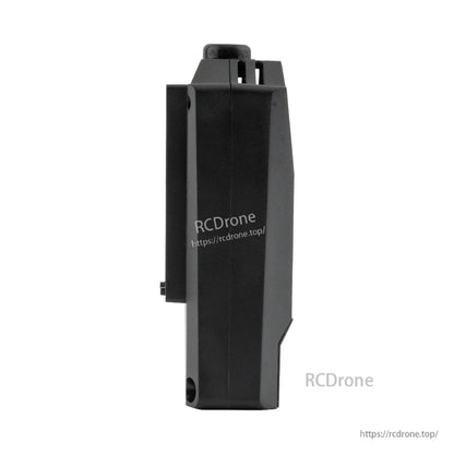 Side profile of the wireless trainer module showing slim thickness and stepped housing shape