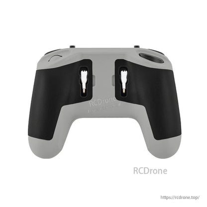 Rear view of T8L controller showing black rubber grips and recessed gimbal stick openings