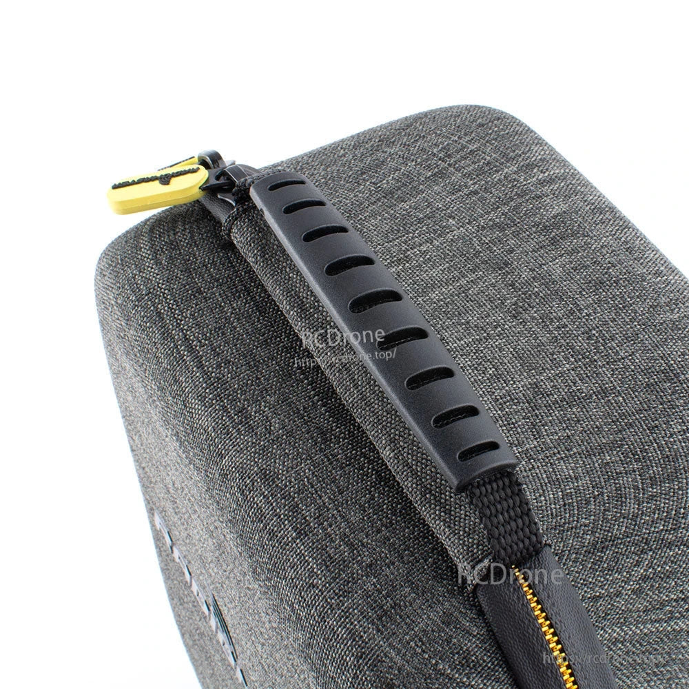 Padded carry handle detail on the grey zippered transmitter case
