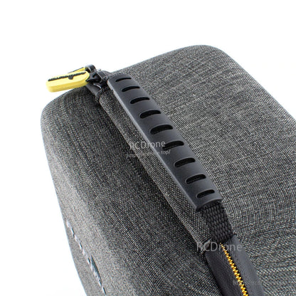 Padded carry handle detail on the grey zippered transmitter case