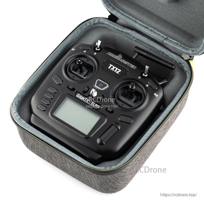 TX12 radio transmitter seated inside carry case, showing snug fit and foam cutouts