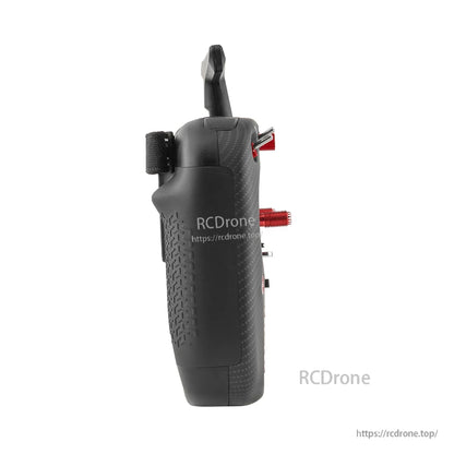 TX15 Max left side profile showing ergonomic grip texture and protruding top controls