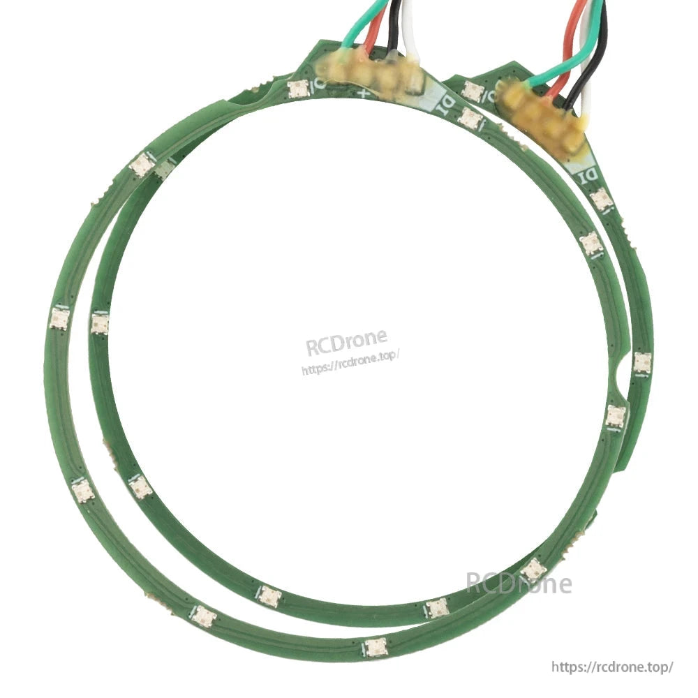 Close-up of TX15 RGB LED gimbal rings showing 10 surface-mount LEDs around each ring PCB