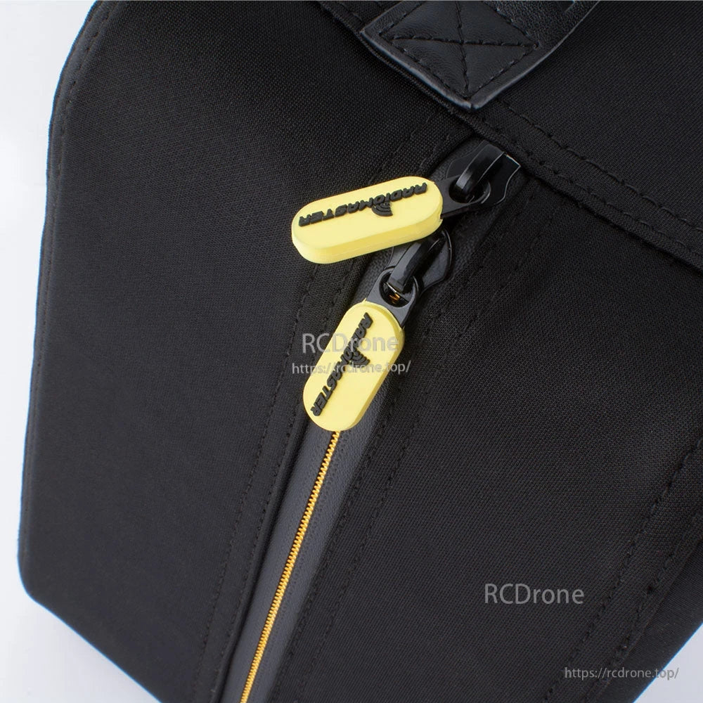 Close-up of zipper and yellow RadioMaster zipper pulls on black case fabric