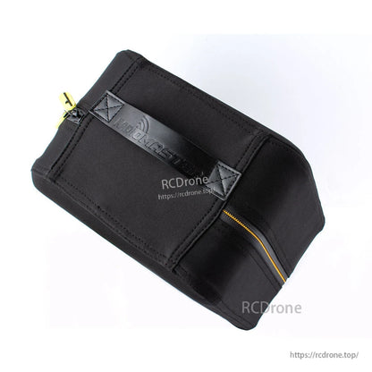 Top view of carrying case showing stitched handle straps and reinforced panels