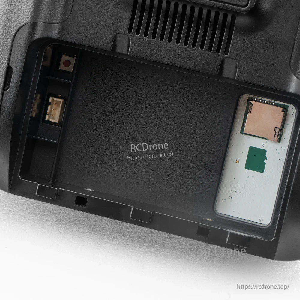 TX16S MK3 MAX rear battery bay compartment close-up with internal connectors and module area
