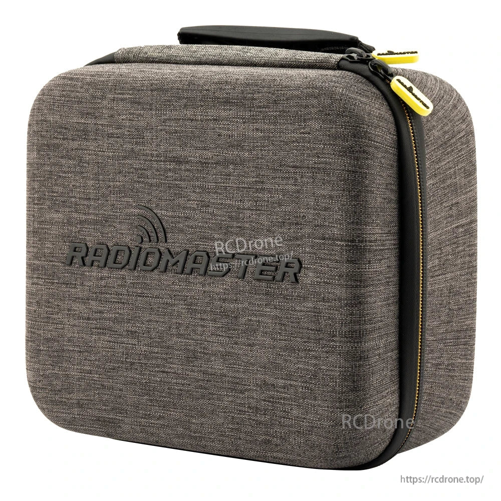 Three-quarter view showing carry case depth, top handle, and yellow zipper pulls