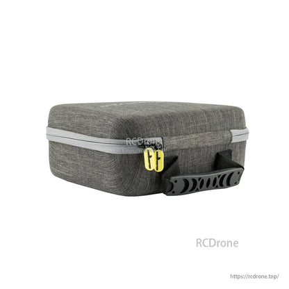 Low side view of Zorro carry case showing dual zipper pulls and black carry handle