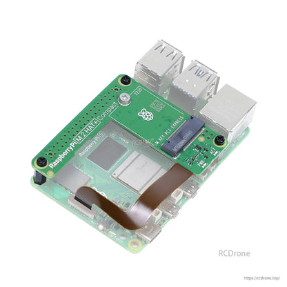 M.2 HAT+ Compact installed on Raspberry Pi 5, showing ribbon cable routing and board position