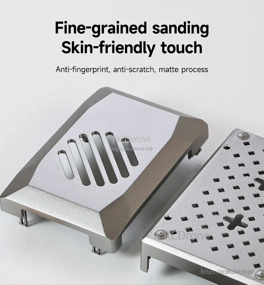 Matte silver case top cover and base showing fine-grained sanding and anti-fingerprint surface texture