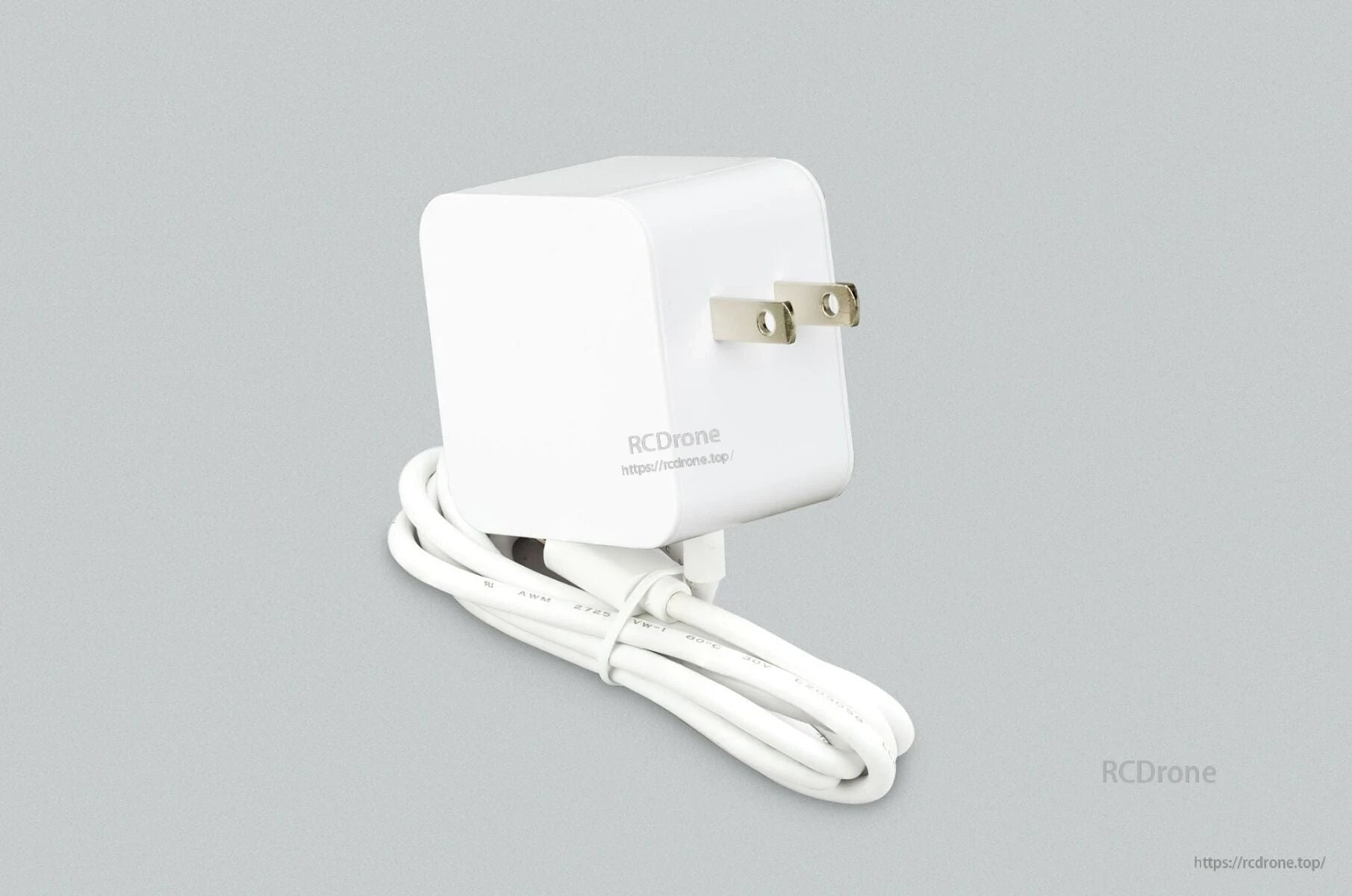 27W USB-C adapter with white cable and plug, designed for Raspberry Pi Compute Module 5 development kit.