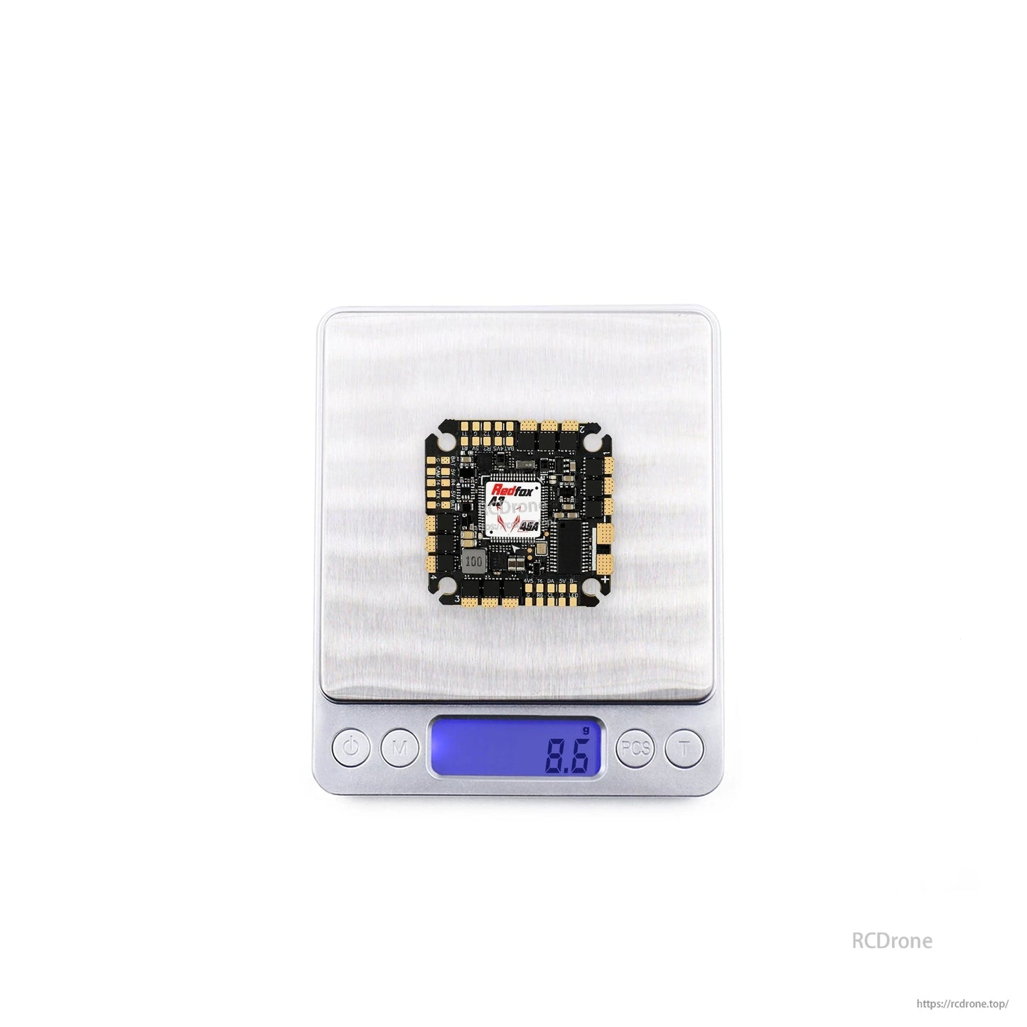 Digital scale photo showing the board centered on platform with 8.9 g displayed