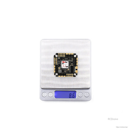 Digital scale photo showing the board centered on platform with 8.9 g displayed