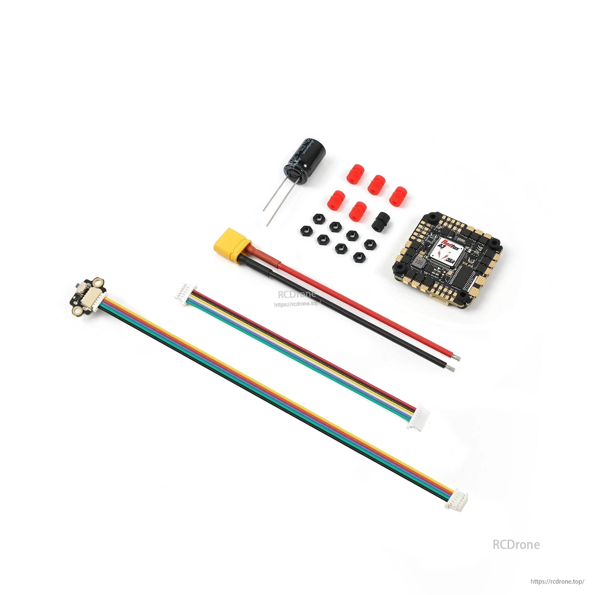 Package contents: flight controller, XT30 power lead, capacitor, gummies, screws, and ribbon cables