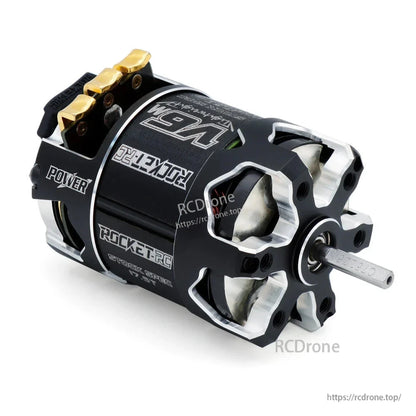 Angled shaft-end view of black and silver motor housing with exposed cooling openings