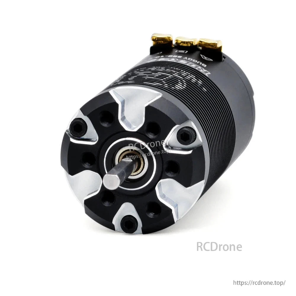 Output shaft end close-up with bearing, mounting holes, and silver end cap details