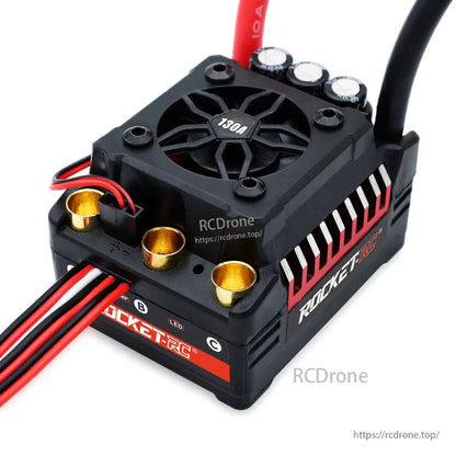 ESC top and connector close-up showing cooling fan, motor bullet ports and signal wiring