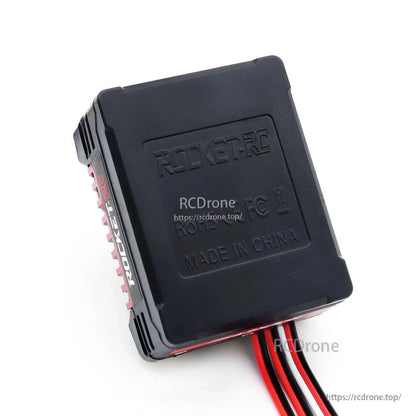 Underside of brushless ESC housing with molded Rocket-RC branding and compliance markings