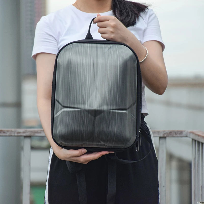 the surface is made of hard and durable ABS, and the back is made from fabric for comfort