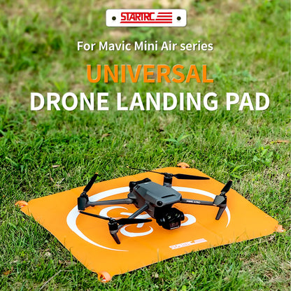 StartRC Drone Landing Pad, Foldable, double-sided Universal drone landing pad for Mavic Mini Air series, featuring pegs, orange design, and StarRC branding.
