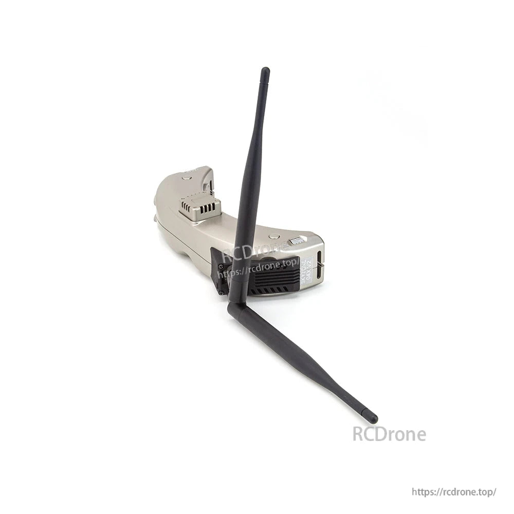 Whip antennas installed on receiver module, one upright and one angled to show mounting orientation