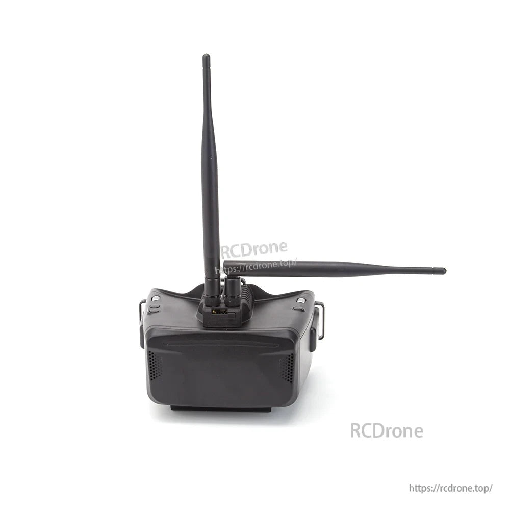 FPV goggles with two rubber-duck antennas attached to the top SMA-style threaded ports, black finish