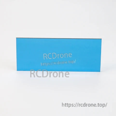 Blue rectangular Cobra X replacement accessory part for FPV goggles, side profile view
