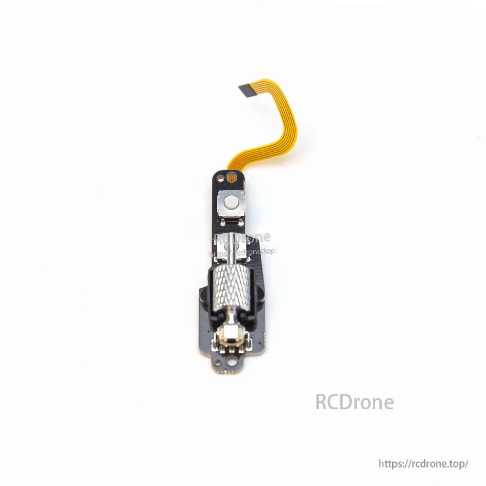 Side view of goggle scroll wheel module and button board with ribbon cable