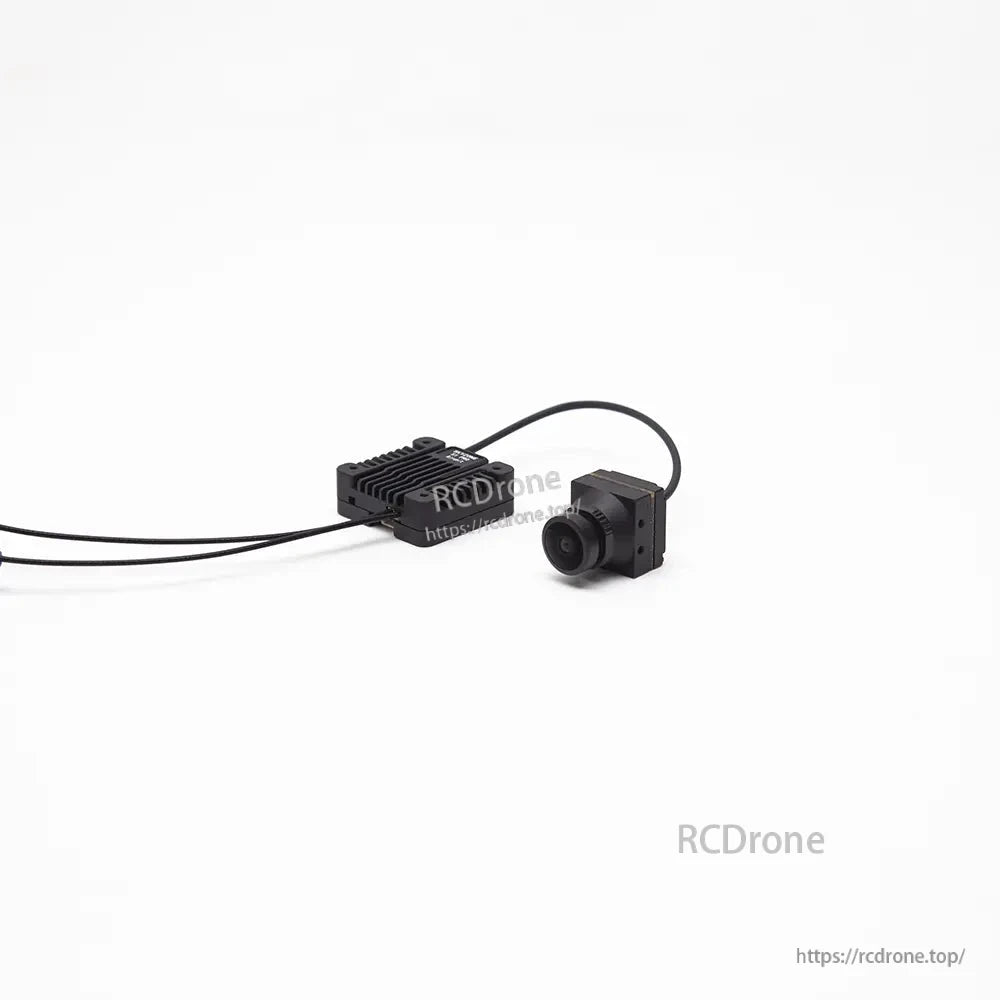 Camera close-up with lens and mounting bracket, wired to finned VTX module in the rear